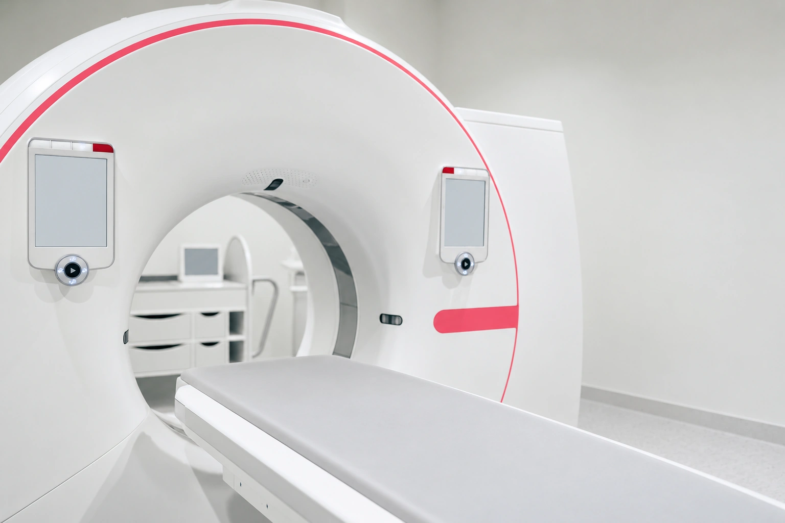 Empty CT scanner with its table ready for a scan