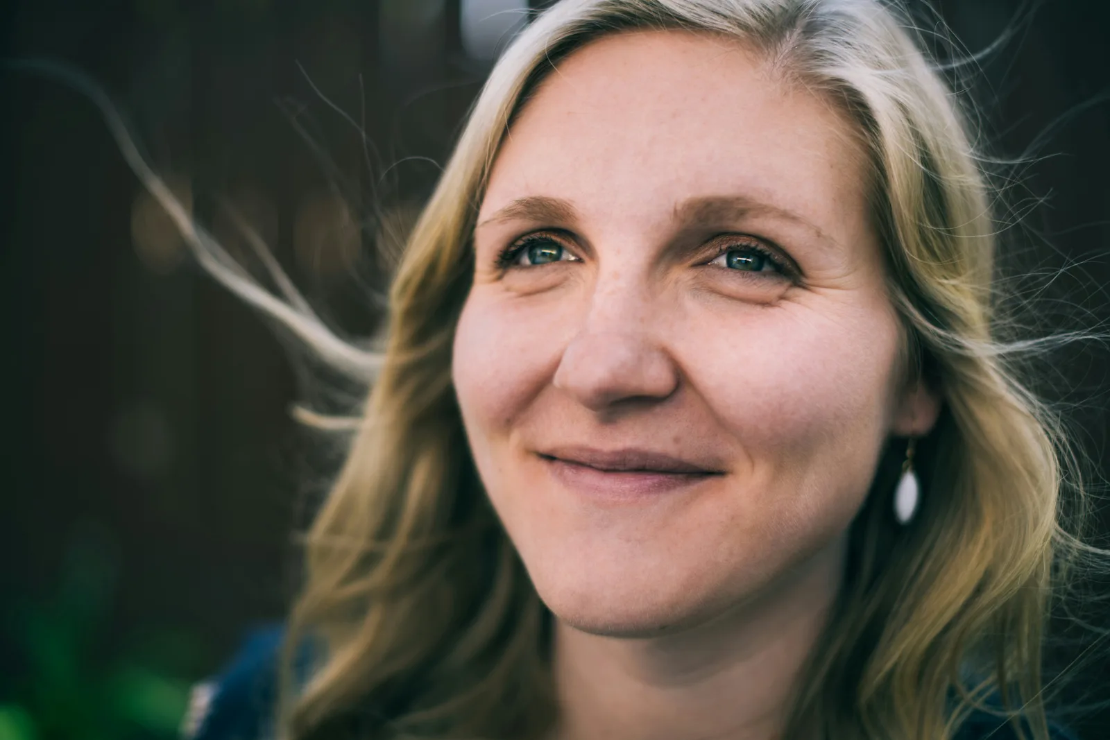 Portrait of a woman with blonde hair outdoors